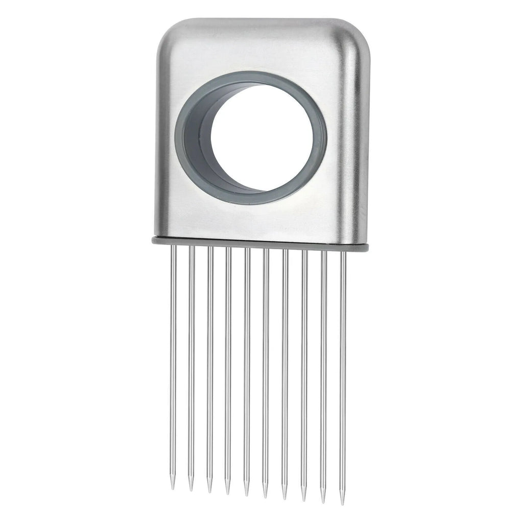 Stainless steel onion holder slicer with non-slip base on a kitchen counter next to a tomato and knife