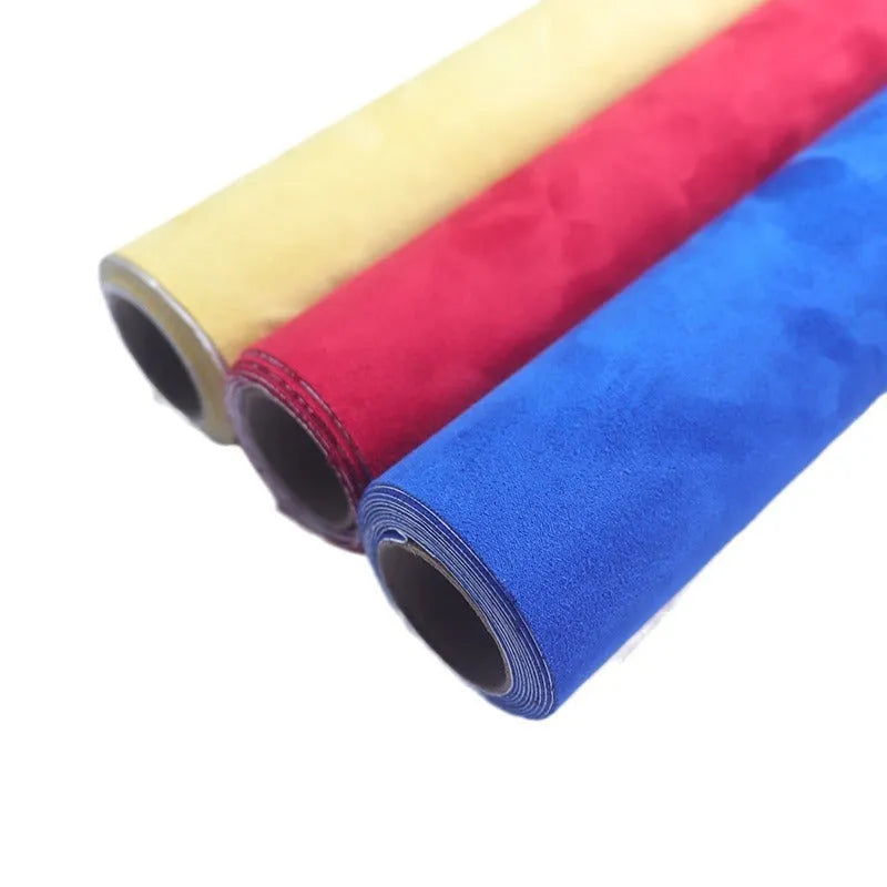 Roll of self-adhesive suede leather in a chosen colour, showing its texture and adhesive backing.