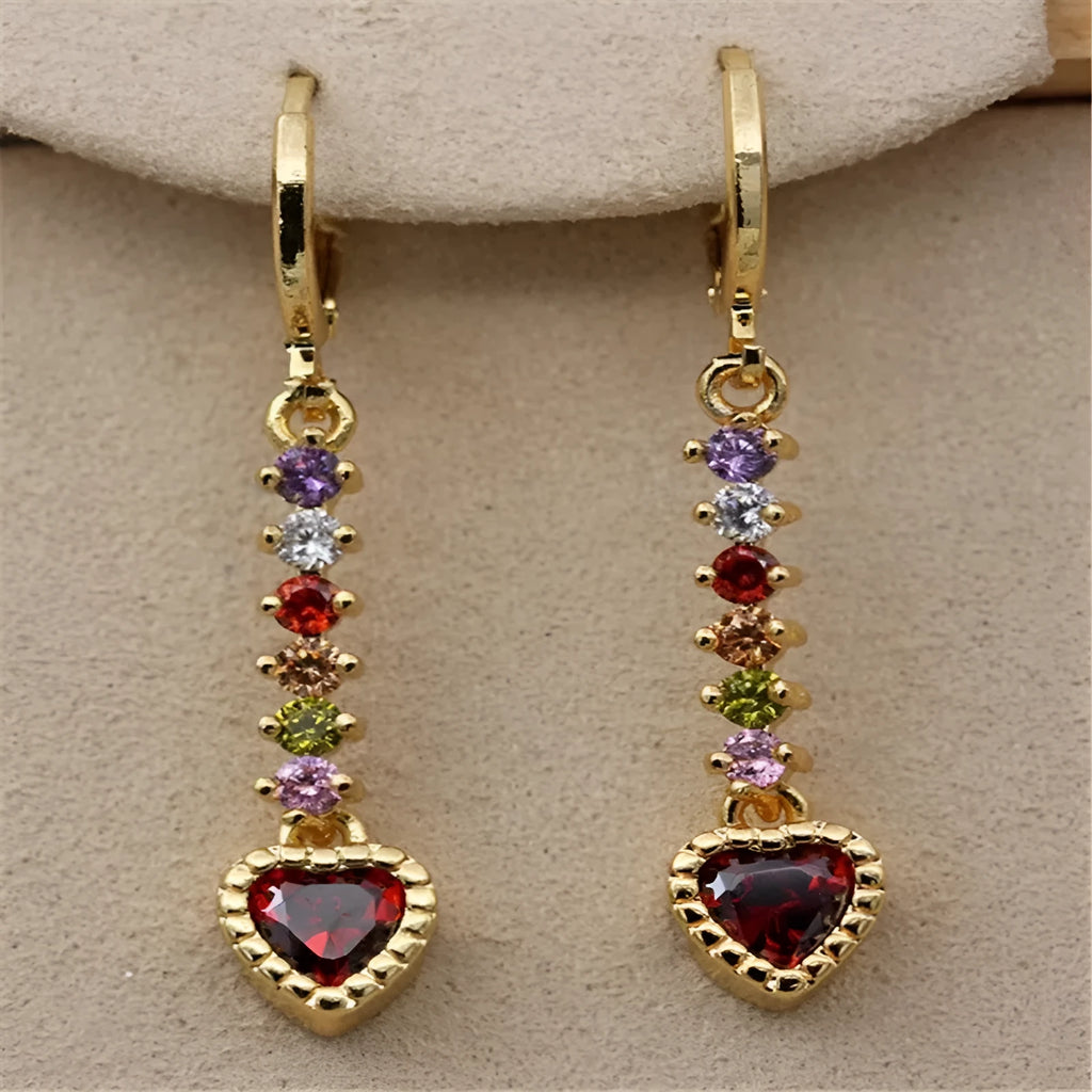 Pair of women's heart-shaped alloy earrings with electroplated gold or silver finish