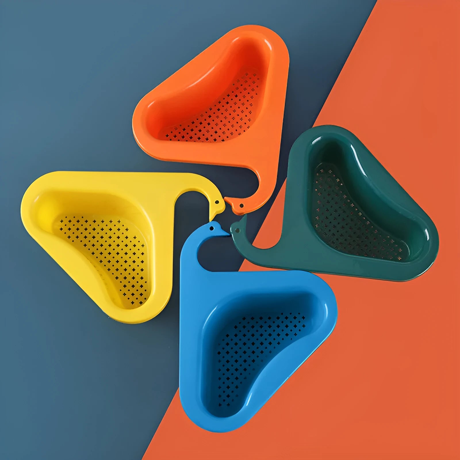 Household sink hanging fruit and vegetable drain basket in green plastic, clipped onto sink rim with slotted base