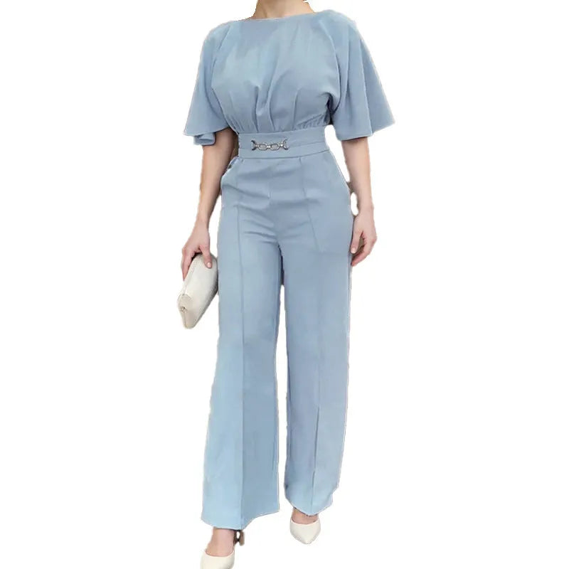 Blue polyester casual suit set with long sleeve top and trousers on a hanger