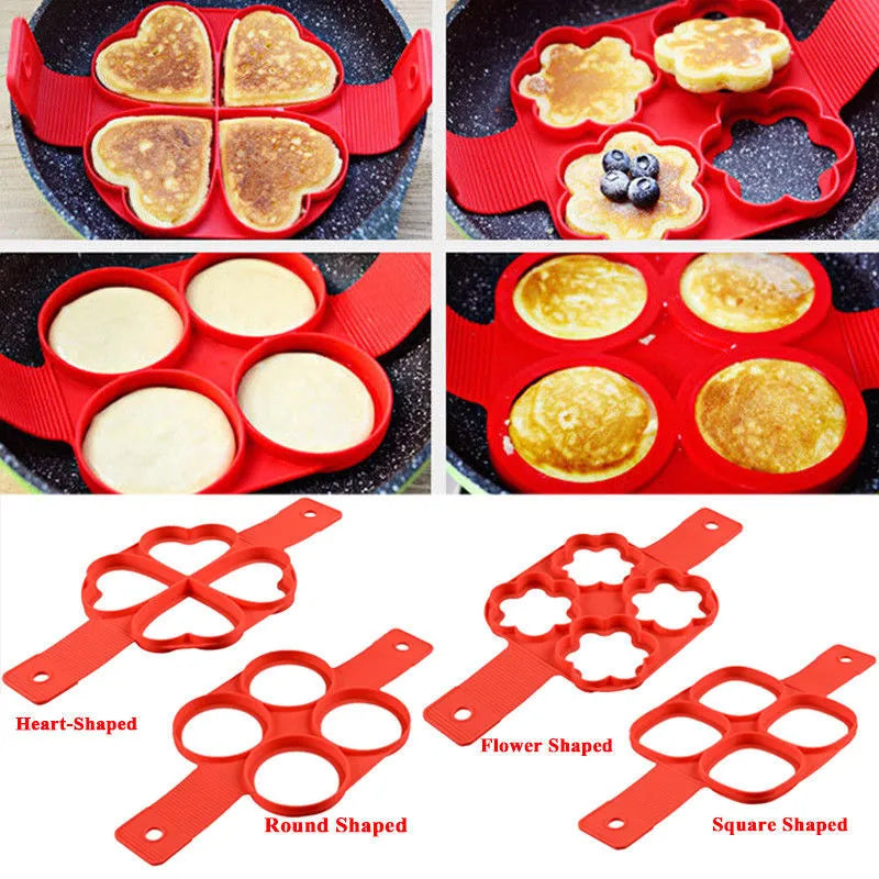 Red silicone nonstick pancake egg ring maker on a cooking surface with a round egg inside