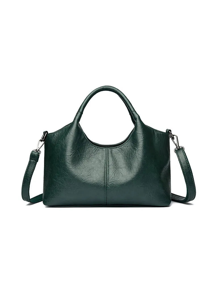 Women's genuine leather large capacity crossbody bag in beige with soft texture and polyester lining