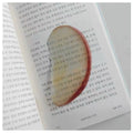 Cute fixed photo cartoon watermelon fruit bookmark made of plastic, approximately 8-10cm in size, transparent style.
