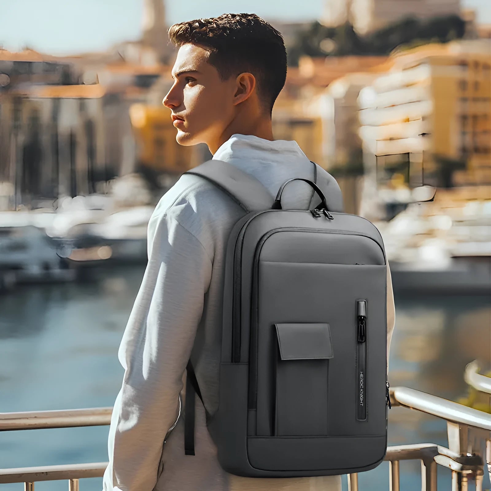 Men's lightweight Oxford cloth backpack in dark grey colour with visible sewing lines
