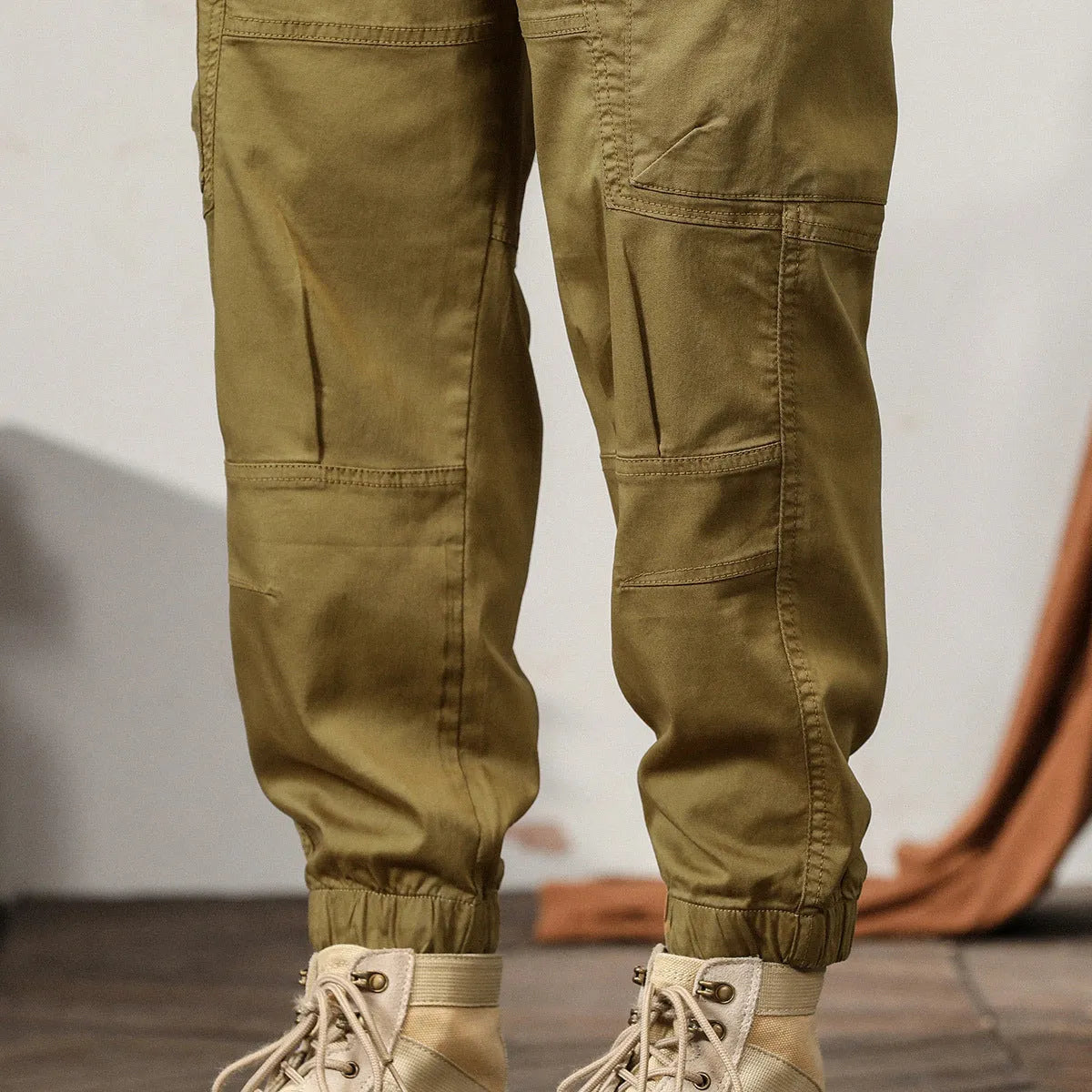 Men's tapered harem pants in cotton fabric with ankle banded legs and Hong Kong retro style