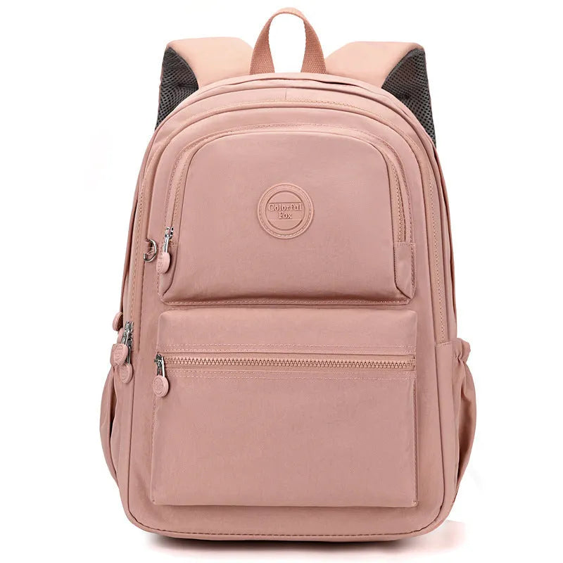 Women's large capacity multi-layer travel backpack in Zhu Mo Black, made from waterproof nylon