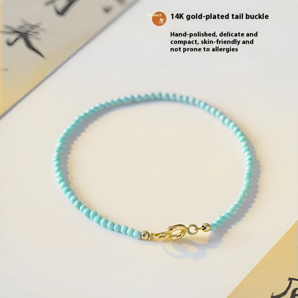 Women's natural turquoise bracelet 2mm beads unisex Chinese style raw ore finish on white background