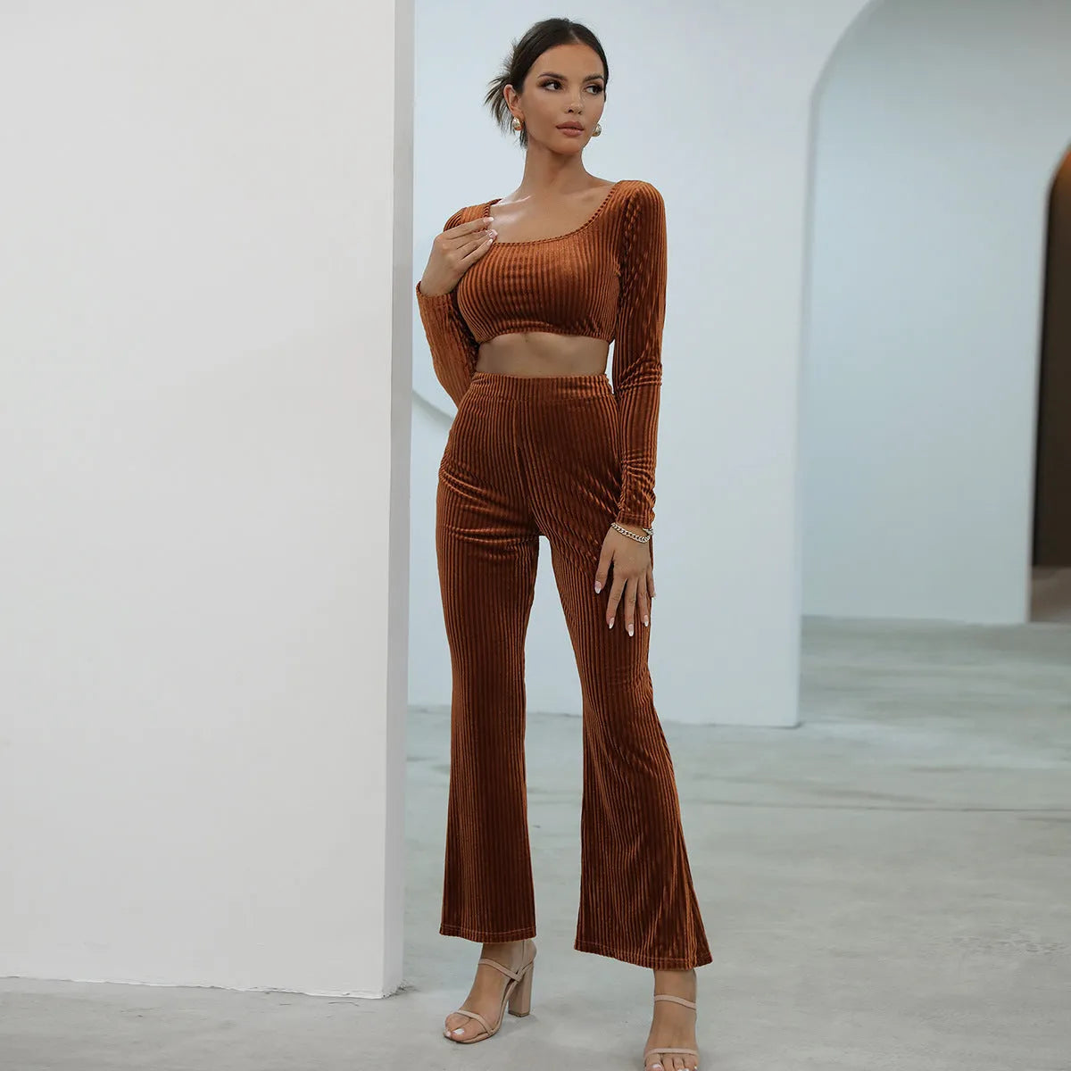 Caramel colour long sleeve sweater and trouser casual set laid flat