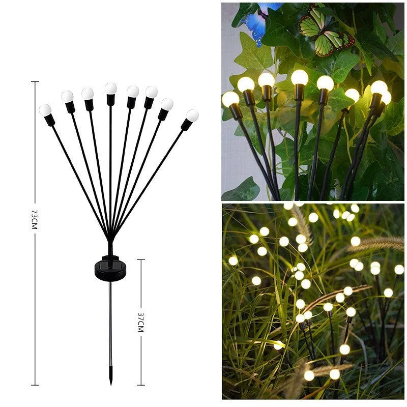 Set of solar-powered LED garden spike lights with multiple heads on stainless steel stakes for lawn or pathway.