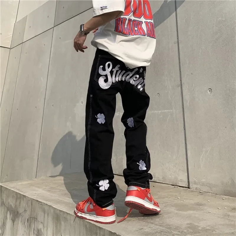 Men's American retro printed casual trousers with button placket and small straight leg in graphic colour