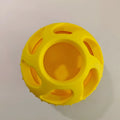Yellow silicone pet slow food ball and snack mold for dogs, bite-resistant dental cleaning toy