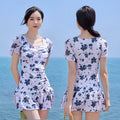 Women's mesh short sleeve swimming dress in Summer White with built-in briefs, one piece swimsuit