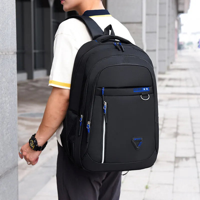 Men's Oxford cloth large capacity backpack in red with letter pattern and air pillow belt