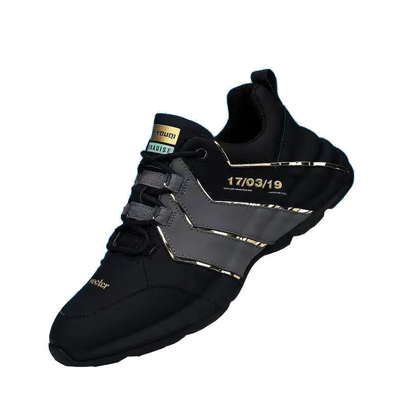 Casual low-top sneakers with round toe, lace-up front, and thick plastic sole in black and grey.