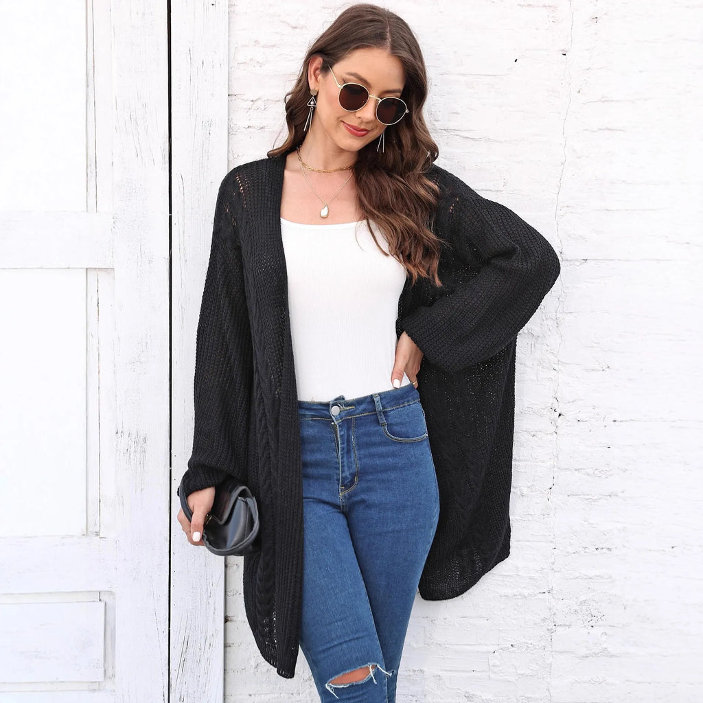 Women's loose fit brown acrylic sweater coat, open front cardigan style on hanger