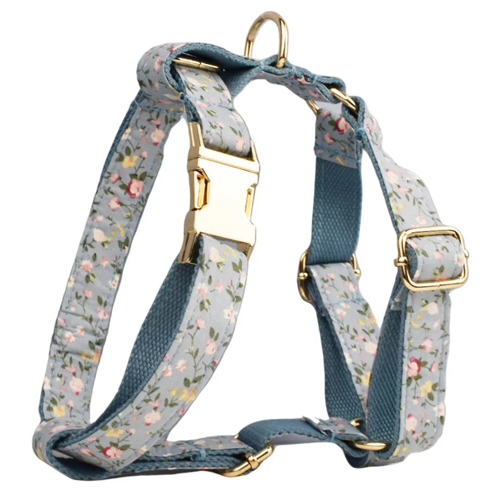 Blue floral polyester cotton dog collar and matching accessory set including leash, vest, bow tie, and waste bag