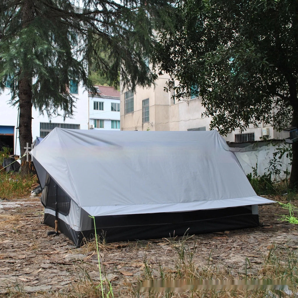 Brown or white A-line pole-free tent pitched with hiking canes showing 210x150x110cm dimensions