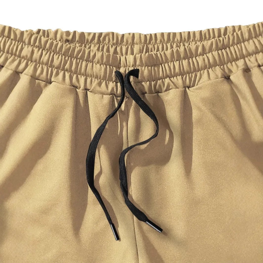 Men's khaki shorts with white coconut print pattern, straight leg style, micro-elastic polyester fabric for summer sports and beach wear