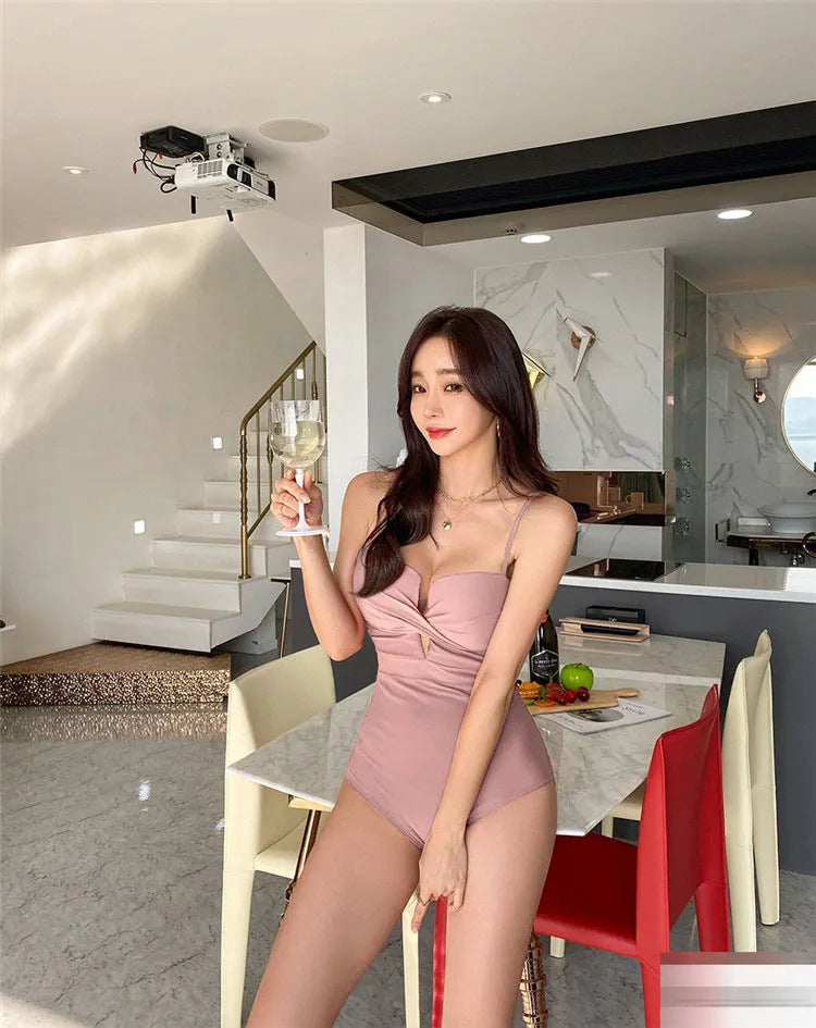 Solid colour small chest push-up spaghetti strap one-piece swimsuit in white, pink, and brown