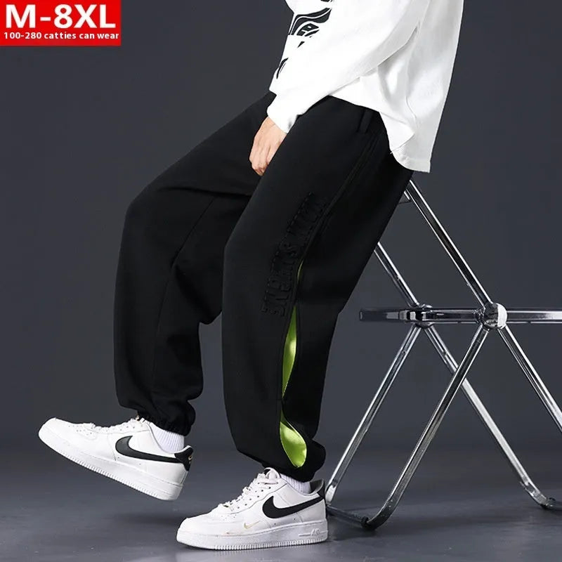 Men's cotton ankle banded pants with collage stitching printing in loose fit design
