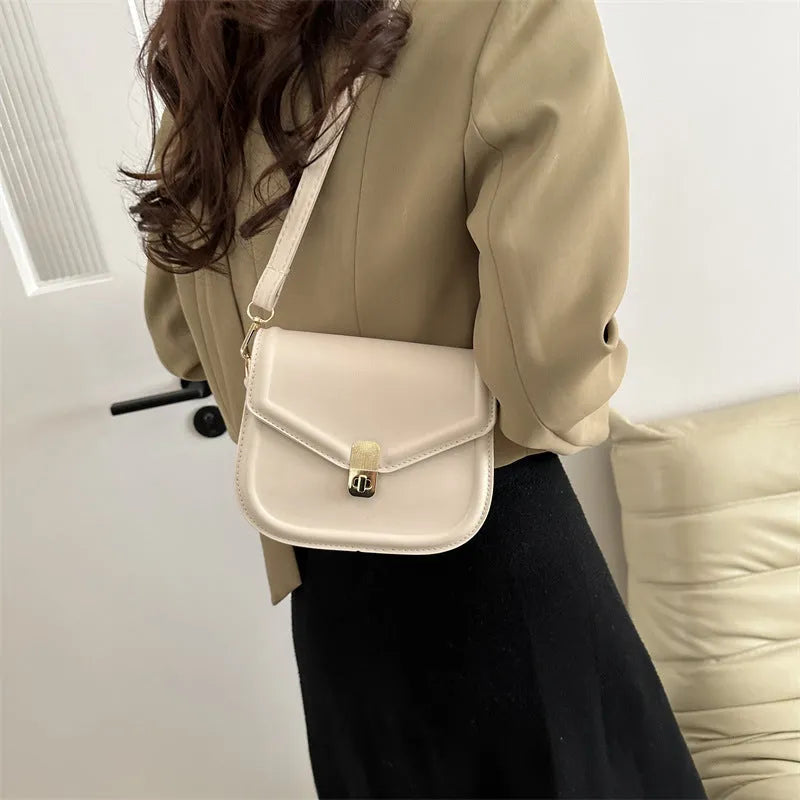 Soft black PU leather clamshell shoulder messenger bag shown open, featuring a horizontal square shape.