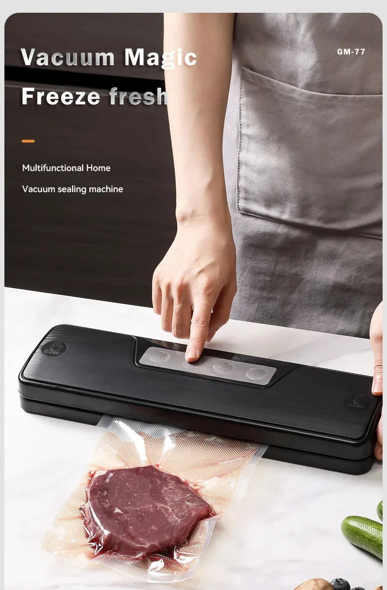 Black compact automatic vacuum sealer machine for food preservation on a kitchen counter.