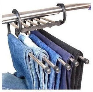Black 5-in-1 stainless steel trouser hanger with five booms and dual hooks on a clothes rack