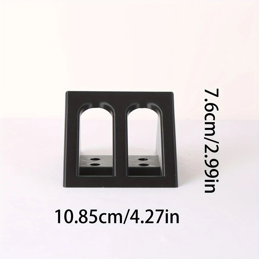 Black punk-style plastic pistol stand for toy gun display.