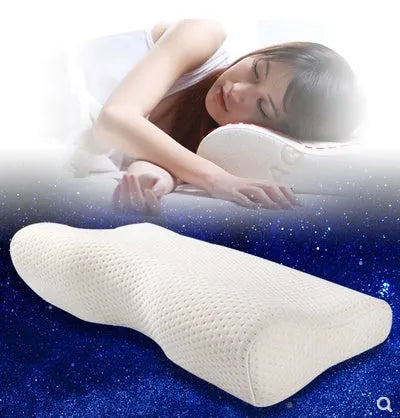 Cervical pillow with memory cotton and butterfly shape in blue, 50x30cm size, on a bed