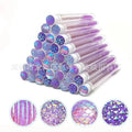 Disposable eyelash brushes in blue, green, pink, and purple colours with transparent storage tubes