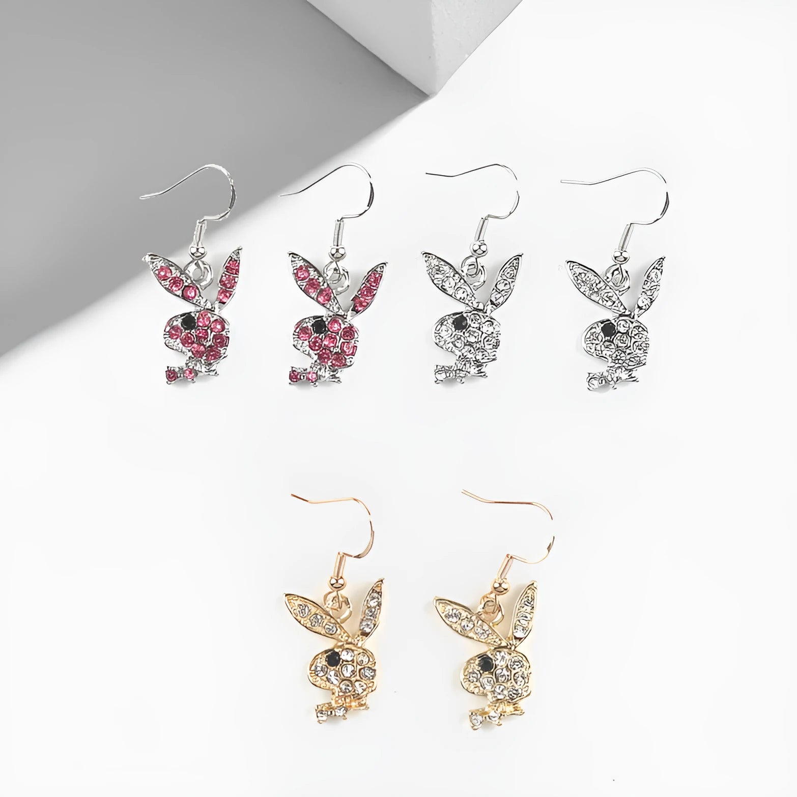 Cute full diamond rabbit stud earrings in silver, pink and gold colours.