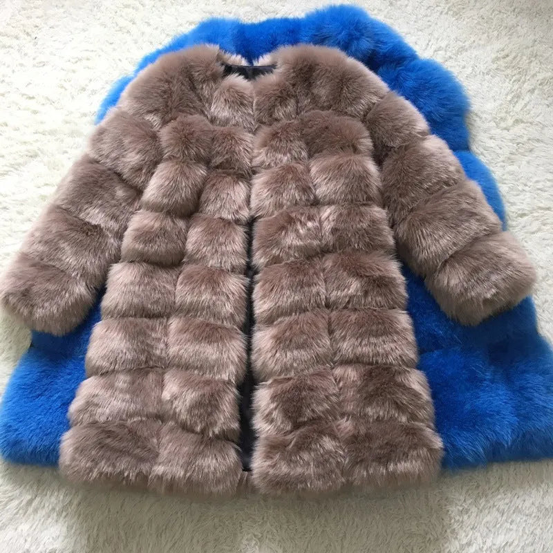 Women's long artificial fur coat in wine red colour showing full-length design and regular sleeves.