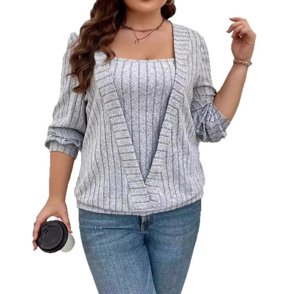 Women's solid colour V-neck false two-piece suit with long sleeves in a loose rib fabric fit.