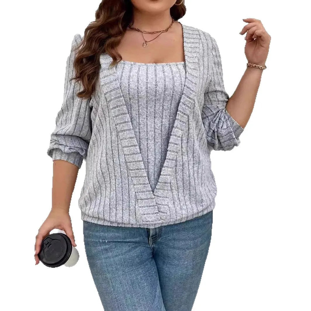 Women's solid colour V-neck false two-piece suit with long sleeves in a loose rib fabric fit.