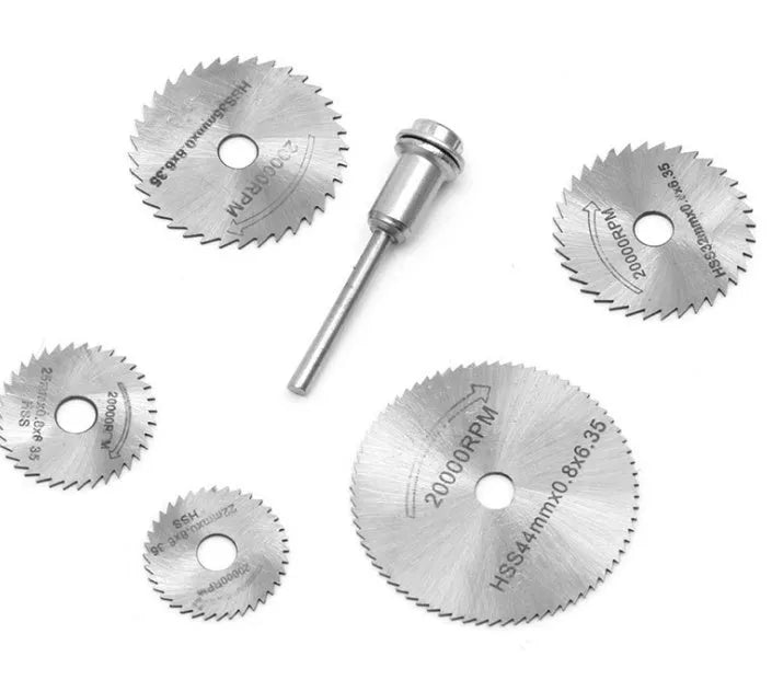 Set of six high-speed steel circular saw blades with a mandrel on a white background.