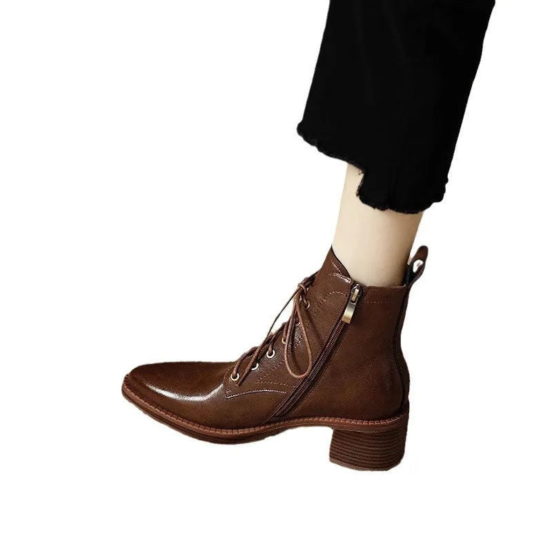 Women's black pointed toe ankle boots with short tube design and block heel