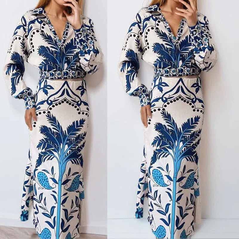 Women's floral print polyester co-ord set with long sleeves and a long skirt on a hanger.