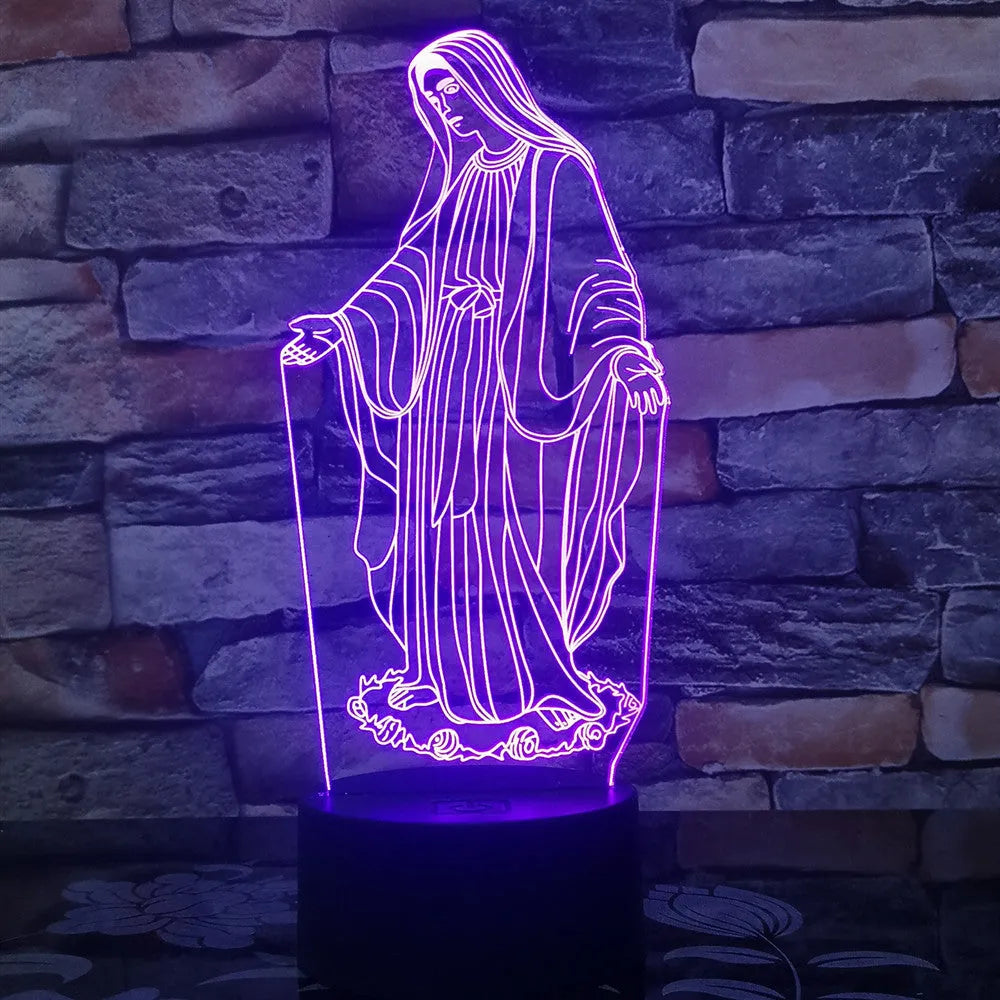 3D LED night light showing colourful dual ring pattern, with remote control and USB cable.
