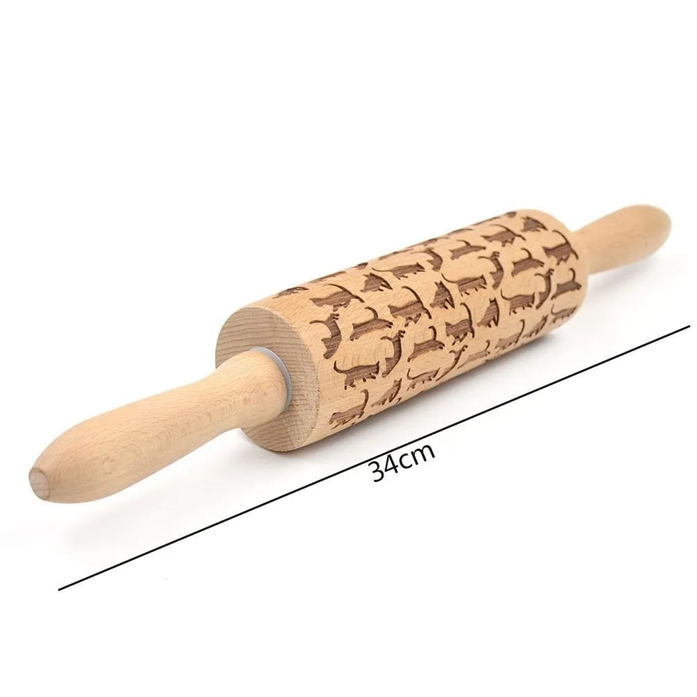 Natural wooden rolling pin with Christmas embossing patterns, 45 cm length, on a light background
