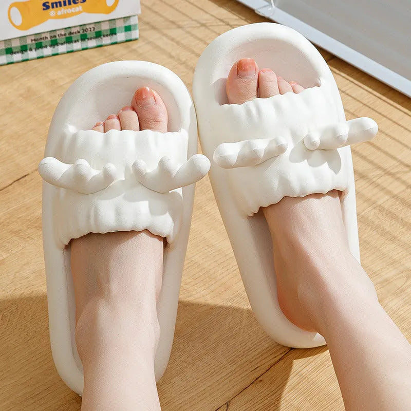 Cute deer horn design EVA flip flop slippers for women and men in light yellow, shown on a non-slip sole.