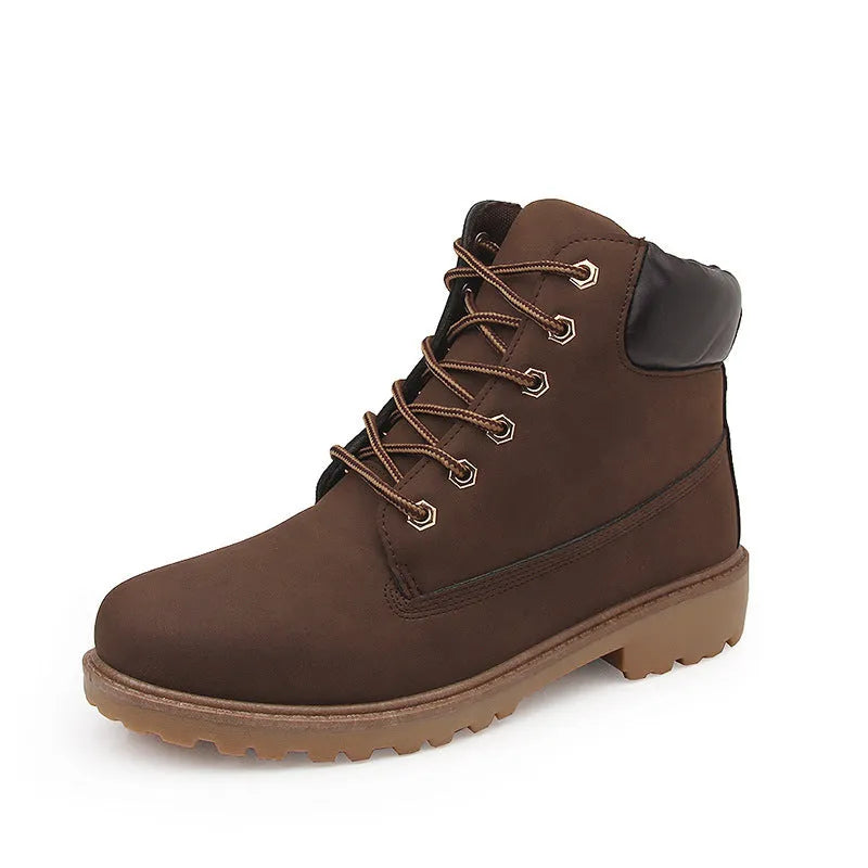 Pink men's high-top Martin boots with front laces and a velvet lining.