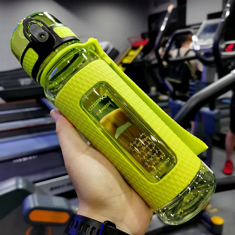 Portable sport water bottle in blue, copolymer polyester plastic, 1100ml capacity, with black cap.