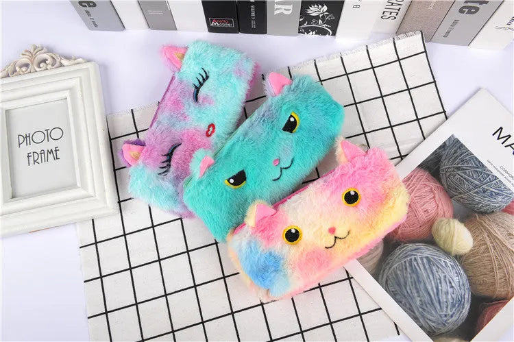Laser colour plush pencil case with cartoon squinting face design, 21x9cm, on a plain background