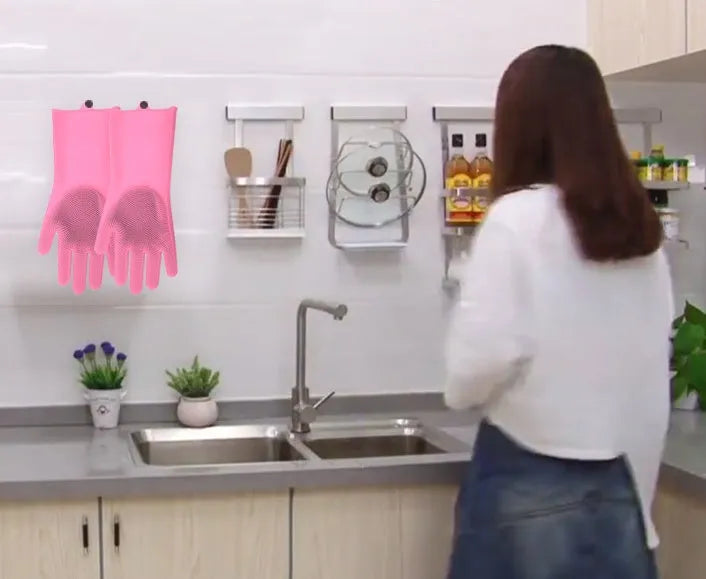 Silicone heat-resistant cleaning brush scrubbing gloves in blue, 357x165mm, on a kitchen counter