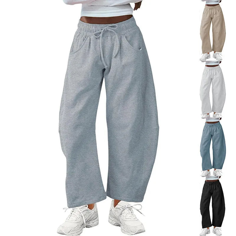 Women's loose cotton cropped sweatpants with drawstring waist and side pockets in multiple colours