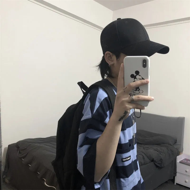 Striped short sleeve t-shirt in polyester fibre, available in blue and yellow, sizes L to XXL.