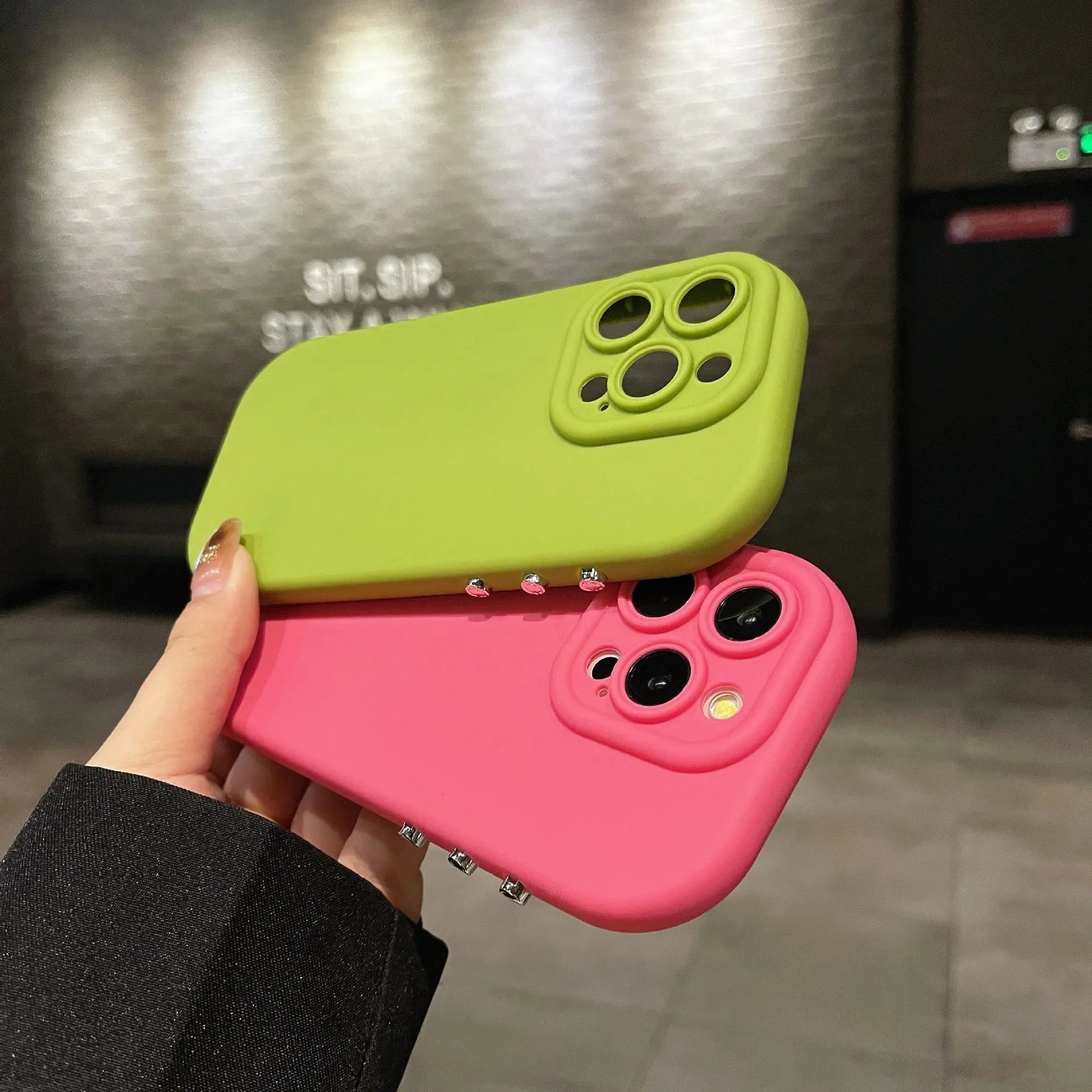 Silicone solid colour electroplated phone case for iPhone in antique white showing button covers and camera cutout