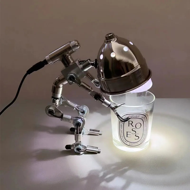 Robot-shaped desk lamp with custom graphic printing in silver or copper finish