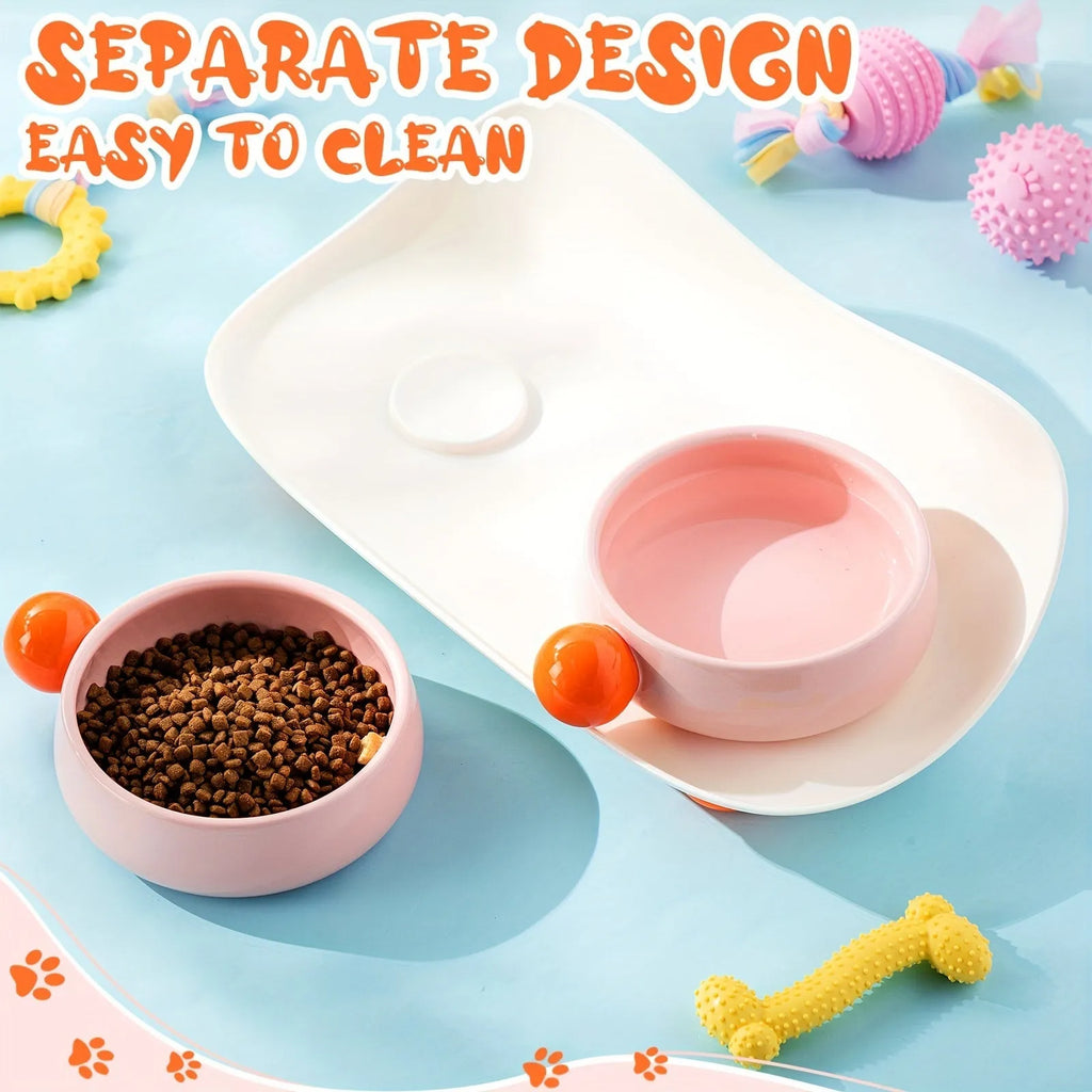 Ceramic raised double pet bowl set in pink yellow colour with non-slip base.
